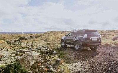 Luxury Jeep Near A Lava Field In Iceland During A Private Airport Transfer to Reykjavik