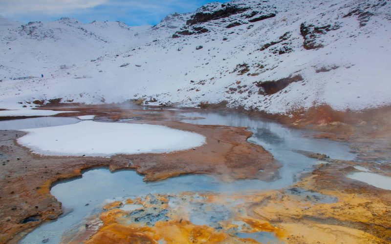 The Colorful Hills of Seltun Geothermal Area Covered in Snow During Winter on Reykjanes Peninsula